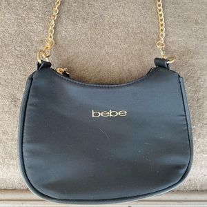 Bebe shoulder purse used it once and it was to small for my liking